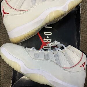 Jordan 11 Retro Platinum Tint Sneakers White Light Gray with Red Accent